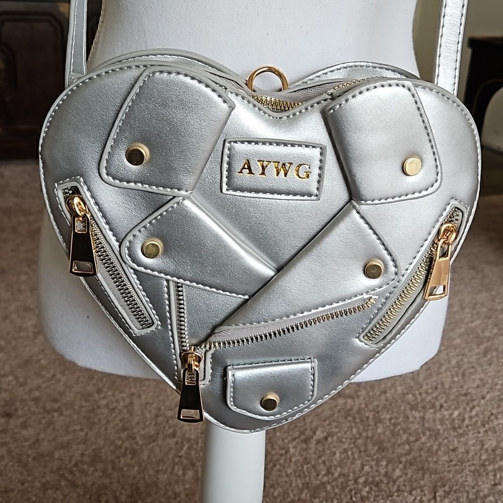 NWOT  Vegan friendly silver crossbody heart-shaped motorcycle jacket handbag